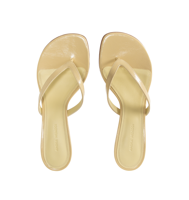 Image 5 of 5 - NEUTRAL - AMINA MUADDI Juliette Thong Sandal featuring rounded open toe, thong strap and 45mm mini CL heel. 100% lambskin. Made in Italy.  