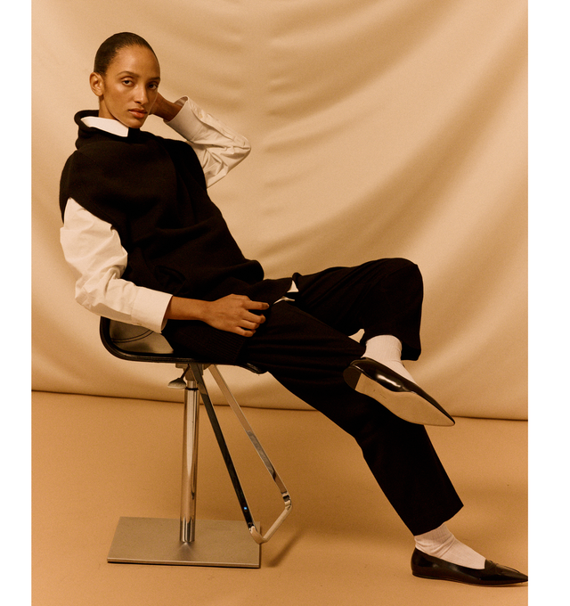 Image 2 of 5 - BLACK - The Row Richelle Pants are a mid-rise style with tapered legs, pressed front and back creases, and side seam pockets. 100% cashmere. Made in Italy.  