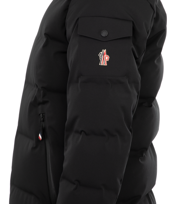 Image 3 of 3 - BLACK - Moncler Montgetech Down Jacket has a 2 way zip front closure, stand collar, removable hood, wrist gaiters, thumbhole cuffs, and an interior powder skirt. Lined with down fill. 49% polyester, 41% polyamide, 10% elastane. Made in Romania.  