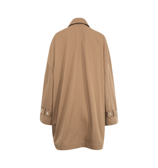Image 3 of 4 - BROWN - TOTEME Oversized Trench Jacket with subtle trench coat accents featuring relaxed A-line silhouette, slanted pockets, adjustable cuff belts, a zipped front and snap buttons. 100% cotton organic. 