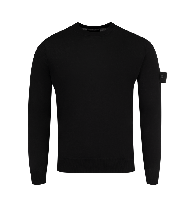 Image 1 of 3 - BLACK - STONE ISLAND Crew Neck featuring thinly ribbed neckline, overlock seams on shoulders and armholes, Stone Island Ghost badge on the left sleeve, ribbed cuffs and bottom band and regular fit. 100% virgin wool. 