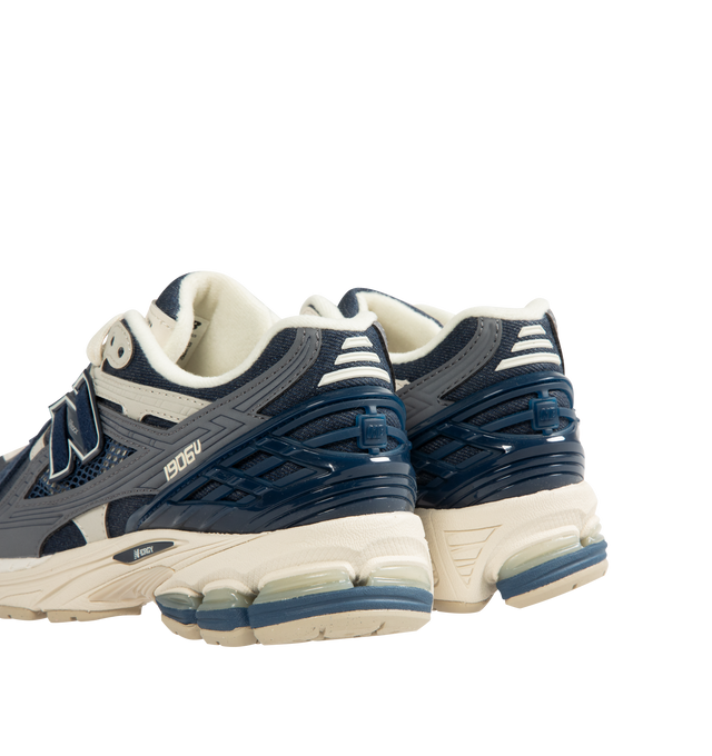 Image 3 of 5 - NAVY - NEW BALANCE 1906 Utility Sneaker featuring a cushioned midsole, breathable mesh upper and supportive construction, stability web outsole technology and lace-up closure. 