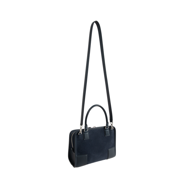 Image 4 of 5 - NAVY - LOEWE Small Amazona 180 Bag in suede featuring a relaxed silhouette anchored by a single toron top handle, designed to be carried open, while a concealed closure secures the main compartment, three carry options: short handle, removable shoulder strap and crossbody, zip closure with two leather zip pullers, two compartments, main compartment closed with magnetic closure, internal flat pocket, left side d-ring for customization, suede and nappa lambskin lining, embossed LOEWE and emboss 