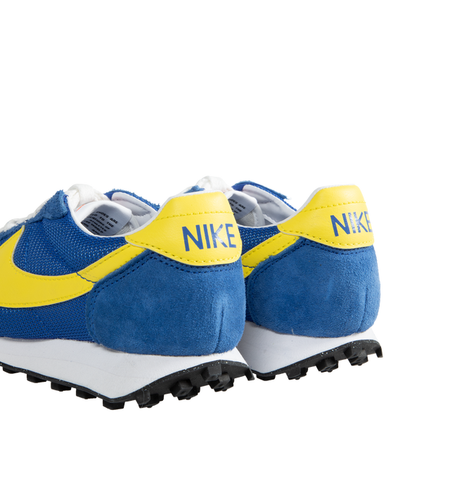 Image 3 of 5 - BLUE - Nike LD-1000 retro running shoe reissued with its iconic flared heel. This edition of the heritage classic returns in nostalgic Game Royal and Opti Yellow hues. Real and synthetic leather merge with airy textiles and the iconic Waffle sole. 