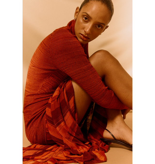 Image 4 of 5 - RED - CHRISTOPHER JOHN ROGERS Turtleneck Drop-Waist Pleated Maxi Dress featuring a drop waist with a pleated, flowy skirt, turtleneck, long raglan sleeves, body-skimming silhouette, full length and slipover style. Rayon/cellulose acetate. Made in USA. 