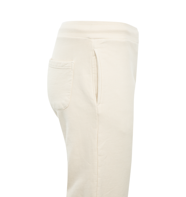 Image 3 of 3 - WHITE - MARKET Vintage Wash Arc Sweatpants featuring appliqud fabric logo, side and back pockets, heavyweight cotton, elastic waist and hem. 100% cotton. 