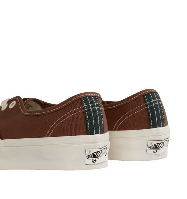 Image 3 of 5 - BROWN - VANS Authentic Reissue 44 LX Sneakers featuring low-top, lightweight canvas upper,  lace-up closure, logo flag at outer side, rubber logo patch at heel, textured rubber midsole, treaded rubber sole and contrast stitching in white. Upper: canvas. Sole: rubber.  