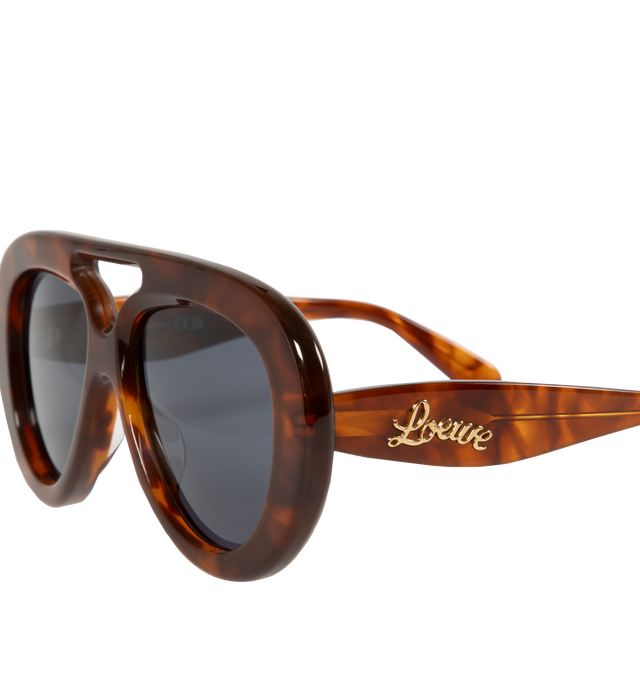 Image 2 of 5 - BROWN - LOEWE Curvy Pilot Acetate Sunglasses featuring bomb acetate, curvy logo on the temples, solid lenses, saddle nose bridge and tapered arms. Acetate. 100% UVA/UVB protection. 