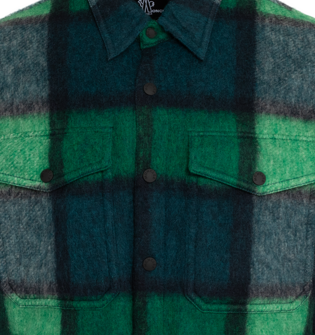 Image 3 of 3 - GREEN - MONCLER GRENOBLE WAIER SHIRT JACKET has a maxi-plaid print, point collar, snap placket, chest flap pockets, side snap pockets, logo patch on the left arm, single-button cuffs, yoked back shoulders and shirt tail hem.  