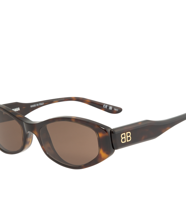 Image 3 of 3 - BROWN - BALENCIAGA Nova Oval Sunglasses featuring Eastman Acetate Renew (40% bio-based, 27% recycled), oval shape, standard fit and BB logo metal plate on both temples. Lens material: Bio-Nylon. 100% UVA/UVB protection. Acetate. Made in Italy. 