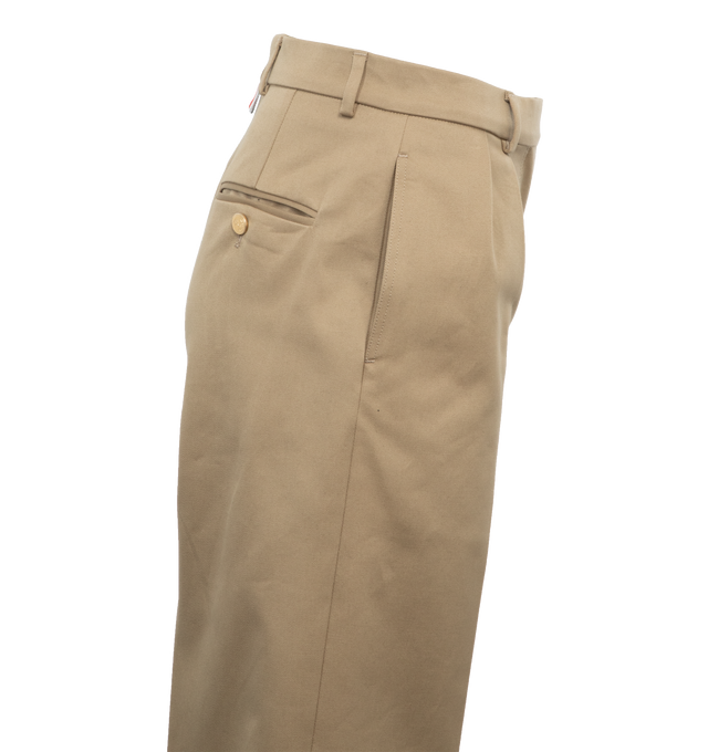 NEUTRAL - THOM BROWNE Relaxed Fit Pleated Trouser featuring tab front closure, slip side pockets, button-fastening back welt pockets and signature striped grosgrain loop tab. 100% cotton.