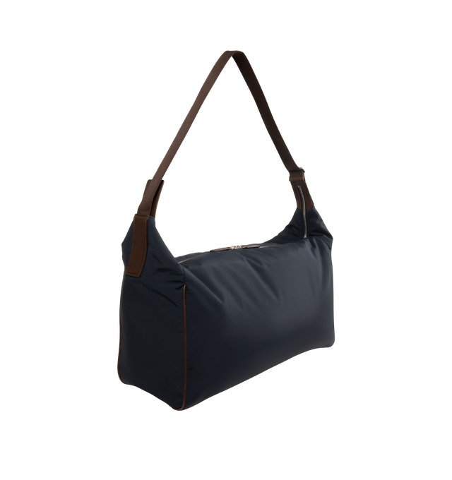 Image 4 of 5 - NAVY - THE ROW E/W Logan Bag featuring contoured shoulder bag in crisp technical nylon with turned-edge construction, woven adjustable flat strap, leather piping, and top zipper closure. 15.75 x 10.63 x 7.48 in. 45% cotton, 25% nylon, 30% calfskin leather. Lined in 56% cotton, 44% nylon. Made in Italy. 