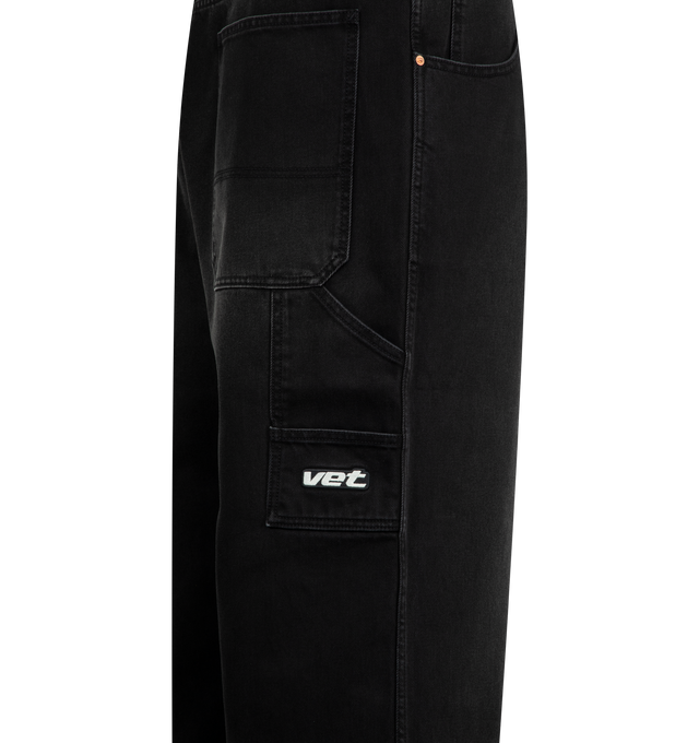 Image 4 of 4 - BLACK - VETEMENTS Hip-Hop Jeans featuring non-stretch denim jeans, belt loops, five-pocket styling, zip fly, patch pockets and logo patch at outseam and hammer loop at outseam. 100% cotton. Made in Italy. 