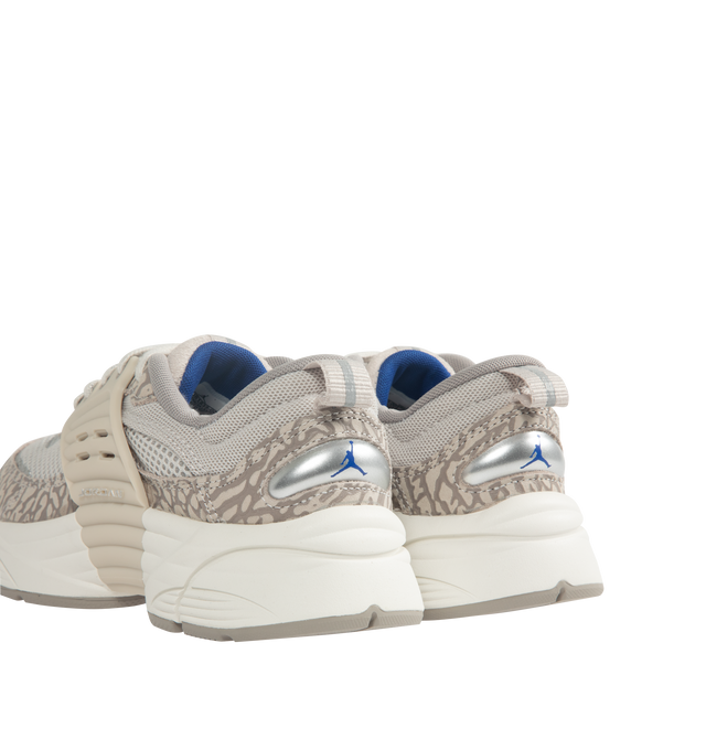 Image 3 of 5 - GREY - Women's Jordan Trunner O/S Sneakers feature a breathable mesh upper with suede overlays and a modern silhouette inspired by the original Jordan Trunner. These lifestyle sneakers combine responsive foam cushioning, molded midfoot support wings, and a durable rubber outsole for lightweight comfort, stability, and everyday traction. Main Material: Mesh and Suede. Midsole: Responsive Foam. Sole: Rubber. 