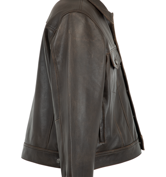 Image 3 of 3 - BROWN - Midnight Rodeo "1968" Leather Trucker Jacket is crafted from pebbled Italian leather and features a cropped trucker silhouette inspired by Elvis Presley's iconic 1968 Comeback Special. Designed with custom branded hardware, double Western yoke detailing, and a smooth midnight satin lining, this Italian-made jacket blends classic Americana influences with Midnight Rodeo's modern edge. Main Material: Pebbled Italian Leather. Lining: Midnight Satin. Fit: Cropped. Made in Italy. 