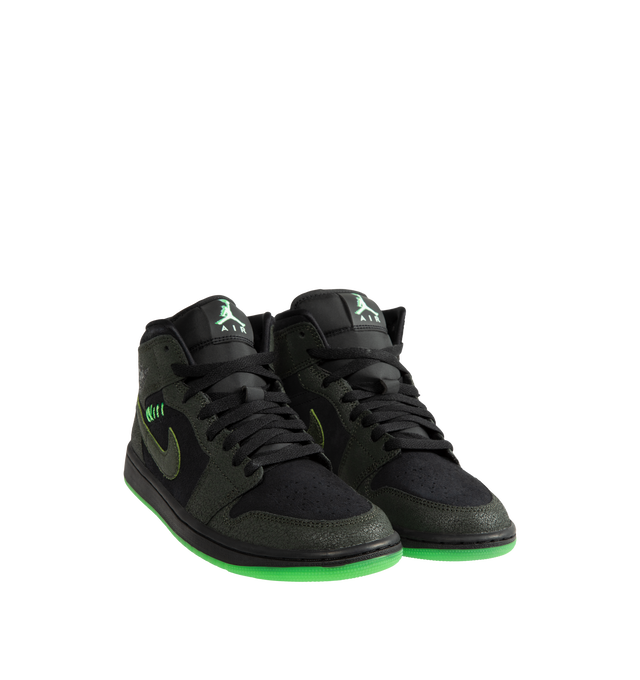 Image 2 of 5 - BLACK - Air Jordan 1 Mid SE Men's Shoes are crafted from premium leather and feature the iconic mid-top silhouette inspired by the original Air Jordan 1. Designed with Nike Air cushioning and a durable rubber outsole, this special edition style delivers everyday comfort while maintaining the classic look that made the AJ1 a legend. Signature details include the Wings logo at the collar, a stitched Swoosh logo, and Jumpman branding at the tongue. Main Material: Leather Upper. Cushioning: Nike  