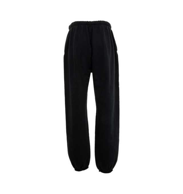 Image 2 of 3 - BLACK - Fear of God Heavy Fleece Sweatpants have an elastic drawstring waist, side seam pockets, elastic hems, and logo details. 83% cotton, 17% recycled polyester fleece.  