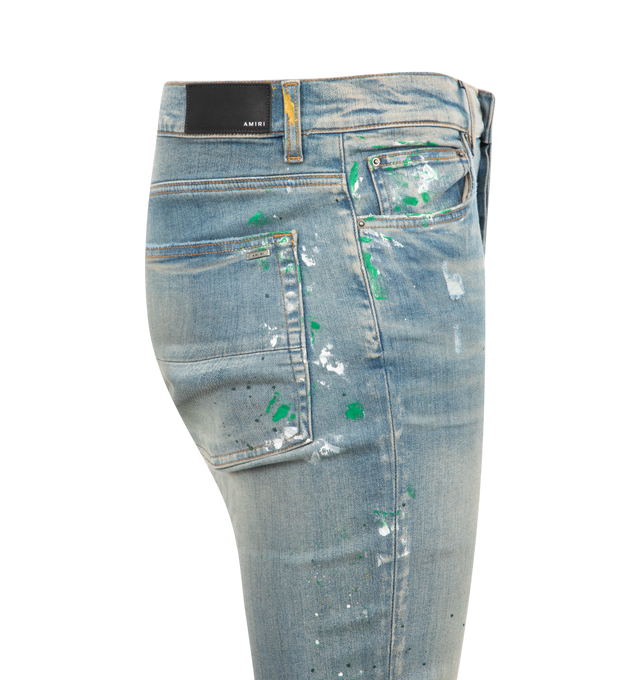 Image 3 of 3 - BLUE - Amiri Painter Skinny Jeans are a 5-pocket style with a concealed button fly, rivet detailing, contrast stitching, and paint splatter details. 100% cotton. Made in USA.  