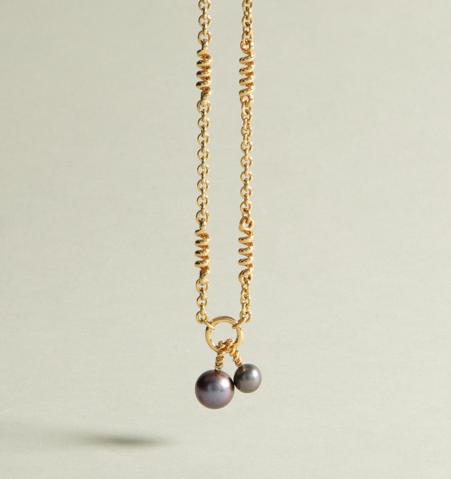Image 2 of 2 - GREY - Boochier Grey Pearl Yellow Gold Beaching Pendant is crafted from 18k yellow gold and features a luminous 9 mm grey freshwater pearl suspended from the brand's playful Beaching collection design. Hirshleifers offers a range of pieces from this collection in-store. For personal consultation and detailed information about jewelry, please contact our dedicated stylist team at personalshopping@hirshleifers.com. This item may be restricted for online purchase to international clients. For as 