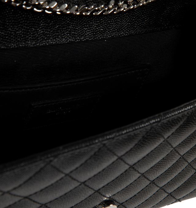 Image 3 of 3 - BLACK - SAINT LAURENT Envelope flap shoulder bag in grain de poudre embossed leather featuring chevron and diamond pattern over-stitching and a long chain shoulder strap, grosgrain lining, one exterior back pocket, magnetic snap tab, one interior slot pocket. Measures 8.2 x 5.1 x 2.3 inches with 21.6 inch chain length. Calfskin leather. Made in Italy. 