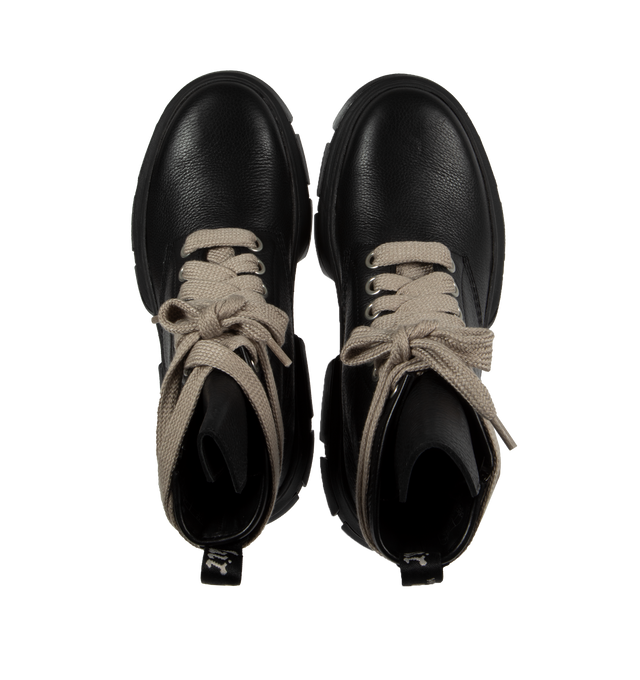 Image 4 of 4 - BLACK - DR. MARTENS X RICK OWENS 1460 DXML boot in black cow leather featuring exaggerated length pearl-tone laces and palladium finish hardware including eyelets  and side zipper, an extended geometric tounge and woven Dr. Martens Airware heel loop. 50% E.V.A + 50% Polivinilclorurol rubber sole with Dr. Martens yellow welt stitch. DXML outsole, an exaggerated interperetation of the classic Dr. Martens sole.  