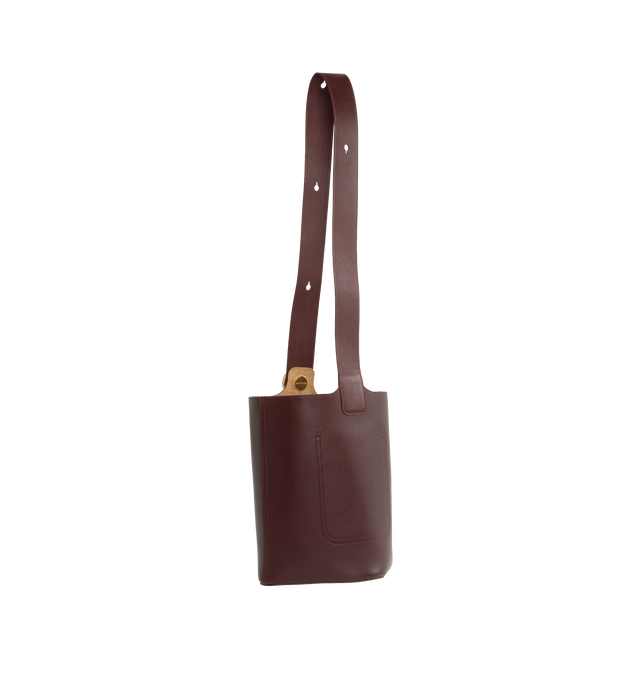 Image 2 of 3 - BROWN - LOEWE Medium Pebble Bucket Bag featuring shoulder or crossbody carry, adjustable strap, magnetic closure, internal pocket, bonded leather lining and Anagram engraved Pebble. 11 x 9.6 x 9.3 inches. Mellow calf. Made in Spain. 