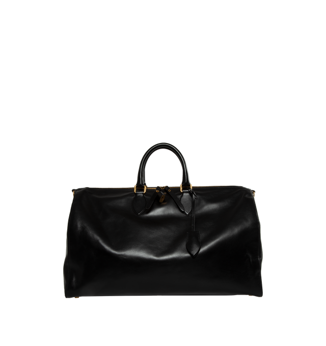 Image 1 of 3 - BLACK - KHAITE Pierre Weekender Bag featuring refined duffel with twinned top handles and gold hardware. Internal zip pocket. Includes lock, key, clochette, and adjustable shoulder strap. 18.11 in x 7.87 in x 10.63 in. 100% calfskin. 