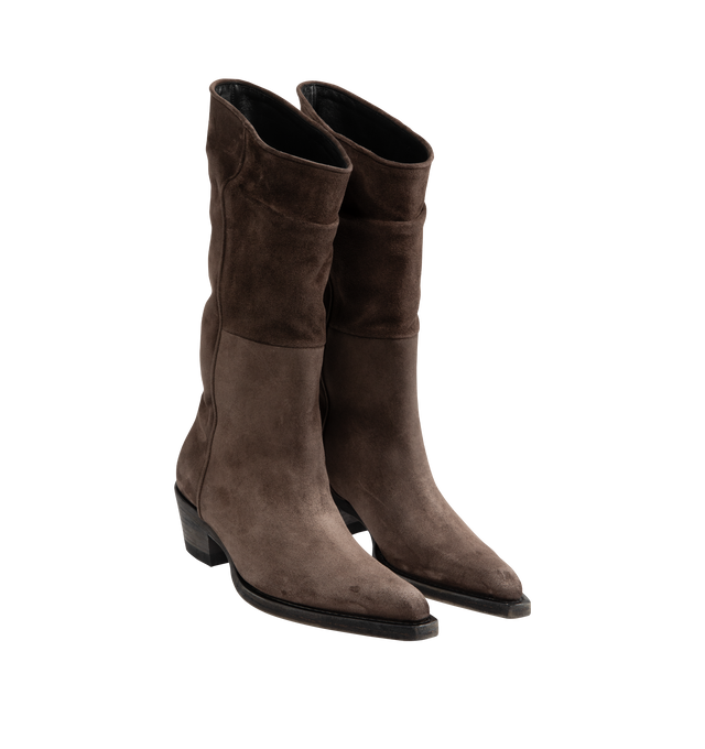 Image 2 of 4 - BROWN - Khaite Clive boot inspired by well-worn Western classics. Featuring stitched welt, 1" stacked leather heel, snip-toe silhouette with deliberately tilted shaft in hand-worked, vegetable-tanned calfskin brushed to a rich patina. Vintage vacchetta (100% calf leather). Made in Italy. 