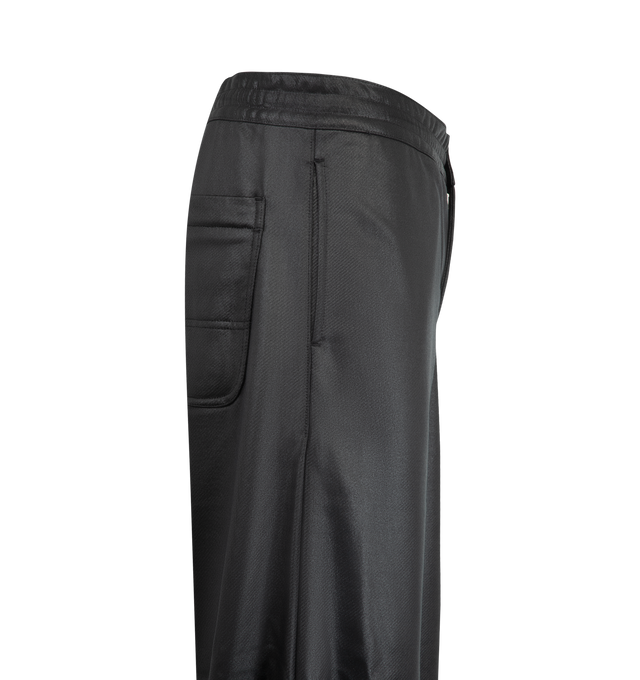 Image 3 of 3 - BLACK - Homme Plus sleek black wide-leg trousers feature a smooth satin finish and an elasticated waistband with a button closure. 