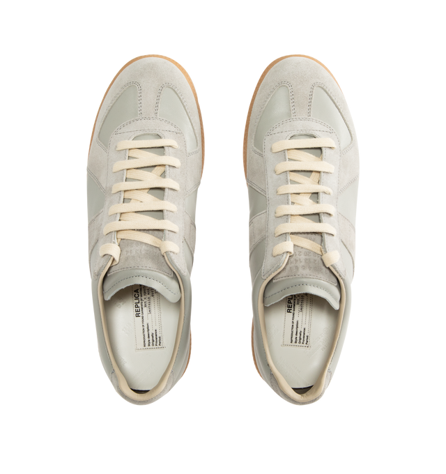 Image 5 of 5 - GREY - MAISON MARGIELA Replica Sneakers featuring lace-up sneakers in buffed nappa calfskin and calfskin suede, contrasting sole, Maison Margiela logo label on the tab, internal Replica label, internal elastic and all-over Maison Margiela logo insole. 100% calf leather. Sole: 100% rubber. Made in Italy. 
