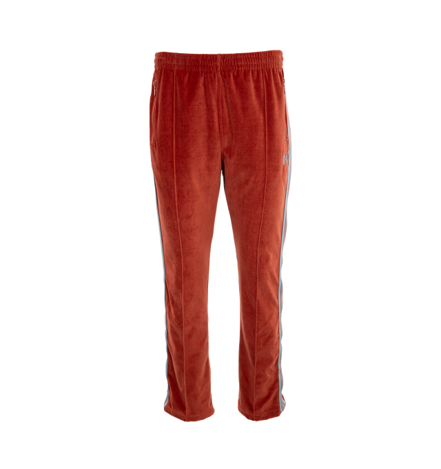 Image 4 of 4 - RED - NEEDLES Narrow Track Pants featuring cotton-blend velour, concealed drawstring at elasticized waistband, three-pocket styling, logo graphic embroidered at front, pinched seam at legs, striped webbing trim at outseams, creased legs at back and unlined. 77% cotton, 23% polyester. Made in Japan. 