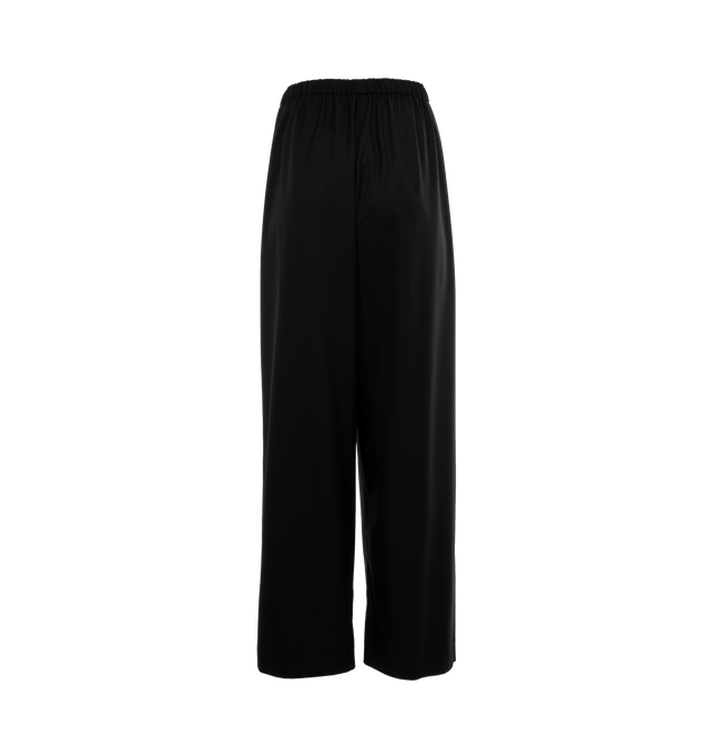 Image 2 of 4 - BLACK - THE ROW Hubert Pant featuring a mid-rise pant in extra fine wool tailoring with tuxedo stripe, drawstring waistband, and side seam pockets. 100% wool. Made in Italy. 