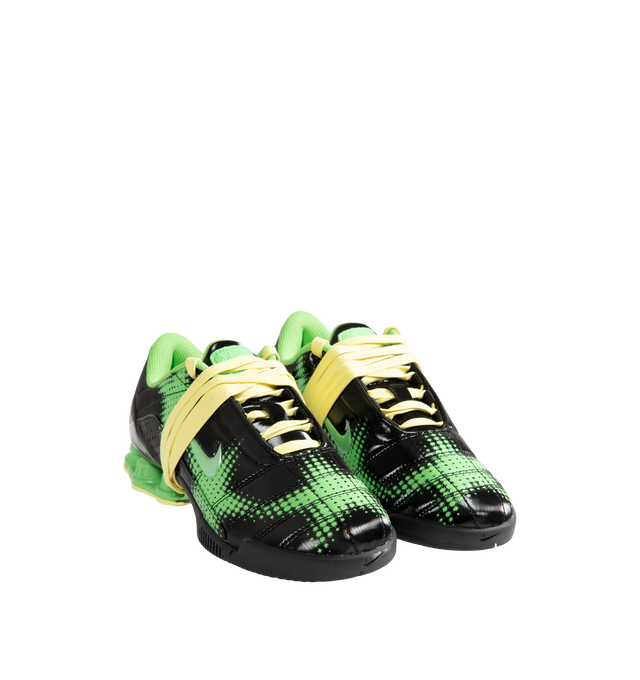 Image 2 of 5 - GREEN - Nike Women's Total 90 Shox Magia Sneakers feature a premium nubuck leather upper with oversized laces and printed graphic detailing, combining the iconic design of the Total 90 with a sleek, tonal finish. Inspired by early-2000s soccer style, these lifestyle sneakers pair signature Nike Shox cushioning with a durable rubber outsole for responsive comfort and everyday wear. Main Material: Nubuck Leather. Midsole: Nike Shox. Sole: Rubber.  
