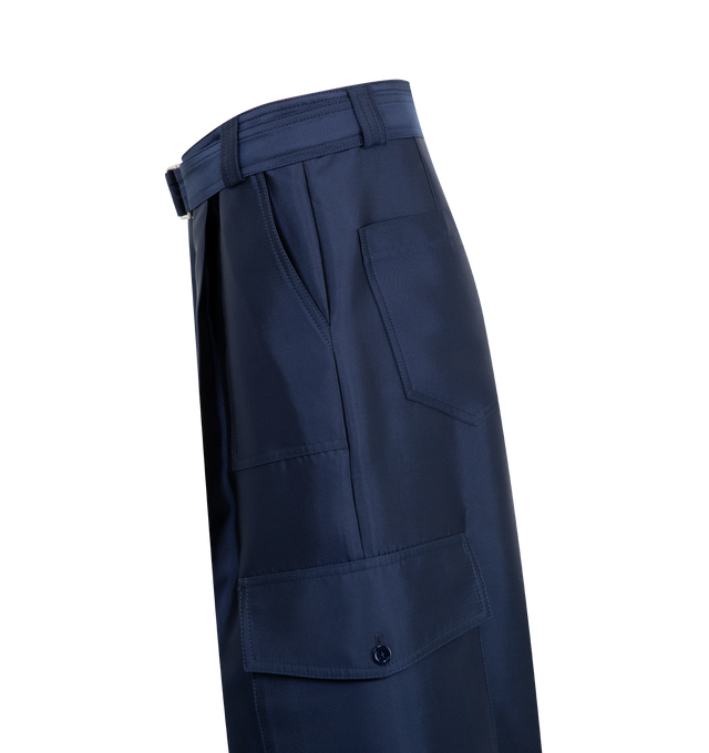 Image 3 of 3 - NAVY - Christopher John Rogers Cargo Pants have a button zip fastening, a belted high-rise waist with pleats, side hip pockets, and back patch pockets. 70% cotton, 30% polyester. Made in USA.  