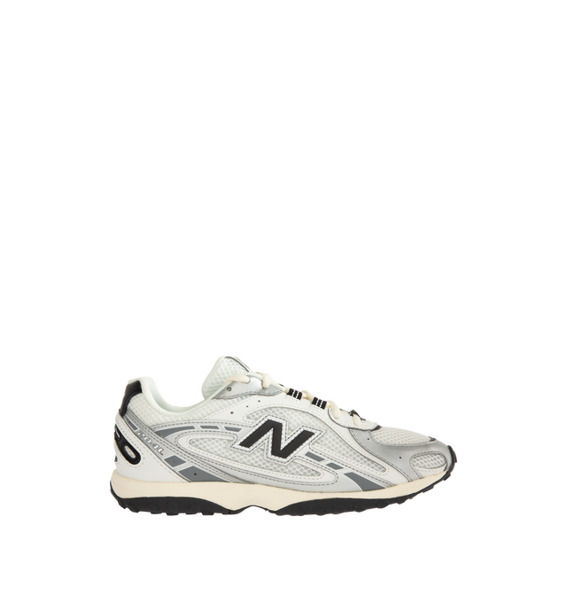 Image 1 of 5 - GREY - New Balance Mens 204L Sneakers feature a low-profile silhouette with a synthetic upper, embossed overlays, screen-printed saddle graphics, and double-stacked suede "N" logo. Designed with an EVA outsole and a distinctive tread pattern inspired by 2000s running shoes and 1970s heritage styles. Upper: Synthetic with Suede Details; Outsole: EVA. Made in Indonesia. 