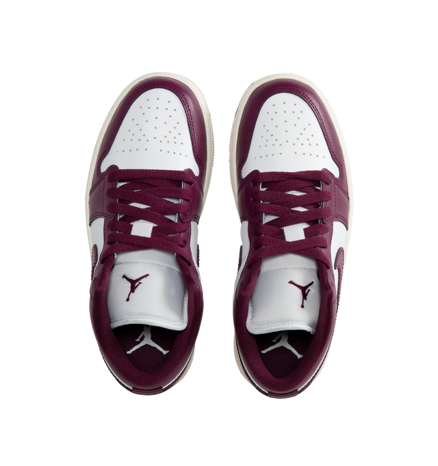 Image 5 of 5 - PURPLE - Air Jordan 1 Low Sneakers are a lace-up style with leather uppers, Air-Sole units for cushioning, and solid rubber outsoles.  