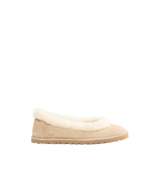 Image 1 of 4 - NEUTRAL - UGG women's Zora ballet flat crafted with a suede upper, plush sheepskin and lamb sockliner, a lightweight sugarcane EVA outsole, UGG Logo, heat-embossed and woven label with The UGG Logo on insole. 