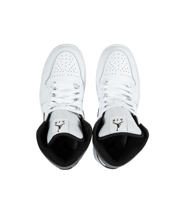 WHITE - AIR JORDAN 1 MID features Leather, synthetic leather and textile upper for a supportive feel, foam midsole and Nike Air cushioning provide lightweight comfort and rubber outsole with pivot circle which gives you durable traction.