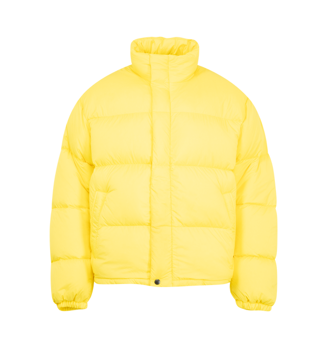 Image 1 of 3 - YELLOW - Canada Goose Men's Sterling Puffer Coat is crafted from lightweight plain-weave poly fabric with a smooth matte finish and features a regular-fit silhouette with wide quilted baffles. Designed for cold-weather protection, this down-filled coat is finished with a fixed hood with hidden cord lock, a concealed snap placket over a two-way zip closure, an exposed bottom snap, elasticized cuffs, and an adjustable drawcord hem. Functional storage includes two exterior zippered welt pockets, 