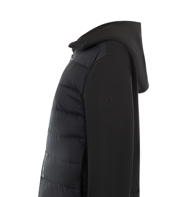 Image 3 of 3 - BLACK - MONCLER Padded Zip-Up Hoodie featuring cotton fleece, nylon lining, down-filled nylon front, hood, zipper closure, zipped pockets, logo print and embossed silicone logo patch. 100% cotton. 100% polyamide/nylon. Padding: 90% down, 10% feather. 