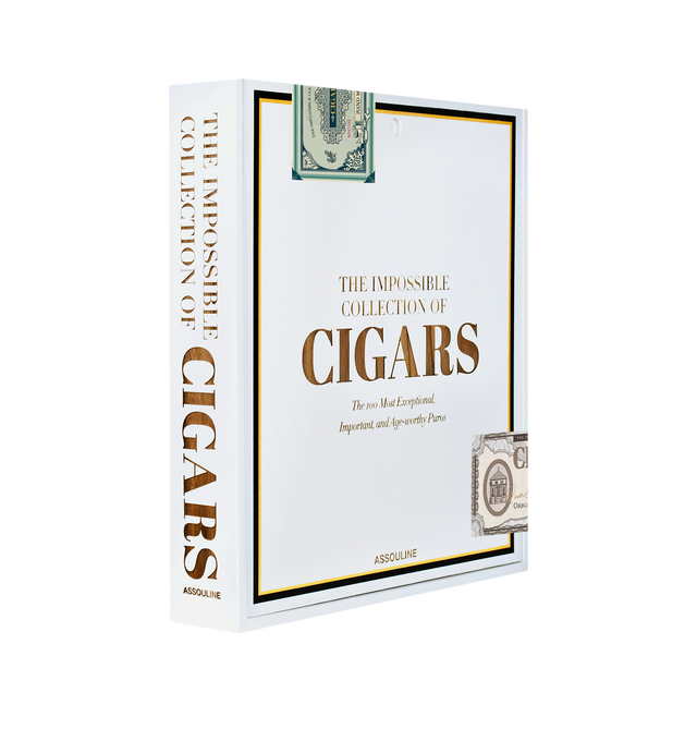 Image 1 of 5 - WHITE - Assouline The Impossible Collection of Cigars is a luxury coffee table book that celebrates the world's most exceptional cigars through expert storytelling, rare photography, and the unparalleled knowledge of cigar authority Aaron Sigmond. Presented in a handcrafted wooden cigar box, this Ultimate Collection volume explores the finest cigars of the twentieth and twenty-first centuries, featuring hand-tipped authentic cigar bands and an extraordinary selection of legendary cigars from  