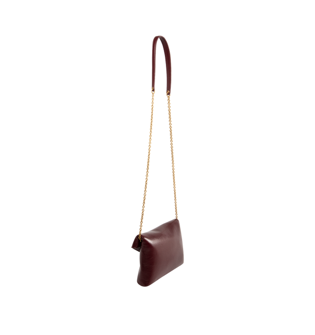 Image 2 of 3 - RED - SAINT LAURENT Chain Pouch featuring shiny calfskin, decorated with the CASSANDRE, may be carried by hand as a clutch or on the shoulder, leather lining, bronze-tone hardware, magnetic closure and one card slot. 7.5" x 4.7" x 1.2". Calfskin. Made in Italy. 
