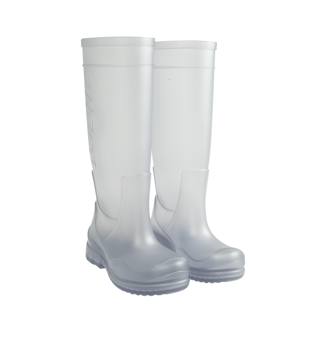Image 2 of 4 - WHITE - Loewe Women's Storm Boot is crafted from molded transparent PVC and features an oversized Loewe logo at the shaft with a distinctive wavy-pattern rubber outsole. Designed in a sleek pull-on silhouette, the boot combines statement branding with durable all-weather construction. Main Material: PVC. Heel Height: 2 cm (20 mm). Made in Italy. 