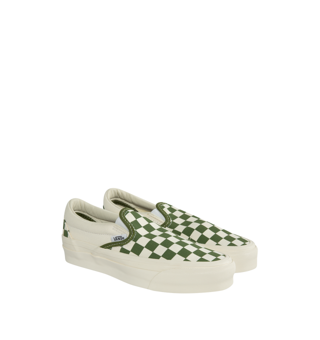 Image 2 of 5 - GREEN - VANS 98 LX Sneakers featuring low-top, slip-on, check pattern printed throughout, elasticized gussets at vamp, padded collar, logo flag at outer side, rubber logo patch at heel, partial leather and canvas lining, textured rubber midsole and treaded rubber sole. Upper: textile. Sole: rubber. Made in Philippines. 