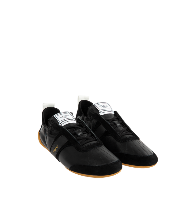 Image 2 of 5 - BLACK - CHLOE Kick Sneaker featuring nylon and suede in an ultra-light silhouette with a flexible recycled rubber sole for a second-skin effect, Chlo logo signs the side and the back loop and boxing-style Chlo label on the tongue. 