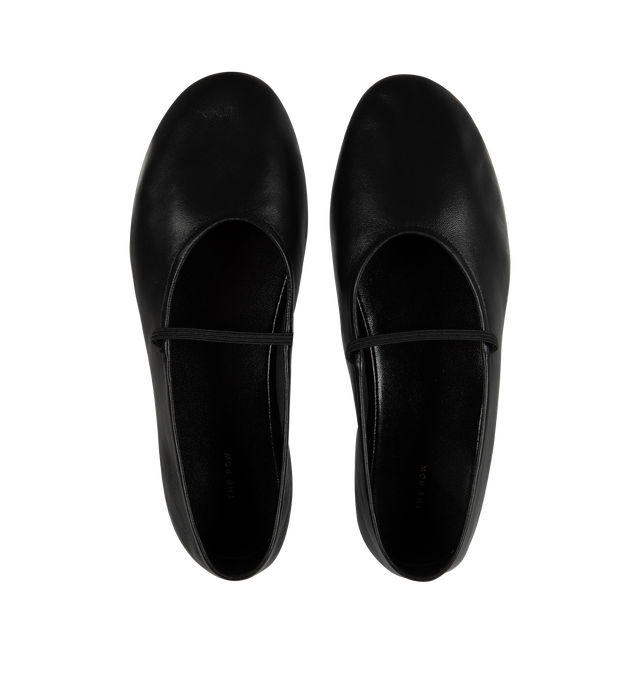 Image 4 of 4 - BLACK - THE ROW Elastic Ballet Slipper featuring round toe and delicate elastic strap across the instep. 100% calfskin upper and lining. Leather sole. Made in Italy. 