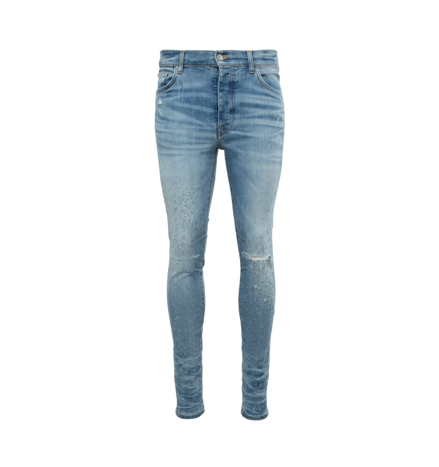 BLUE - AMIRI Crystal Shotgun Jeans featuring belt loops, five-pocket styling, button-fly, leather logo patch at back waistband and logo-engraved silver-tone hardware. 92% cotton, 6% elastomultiester, 2% elastane. Made in USA.