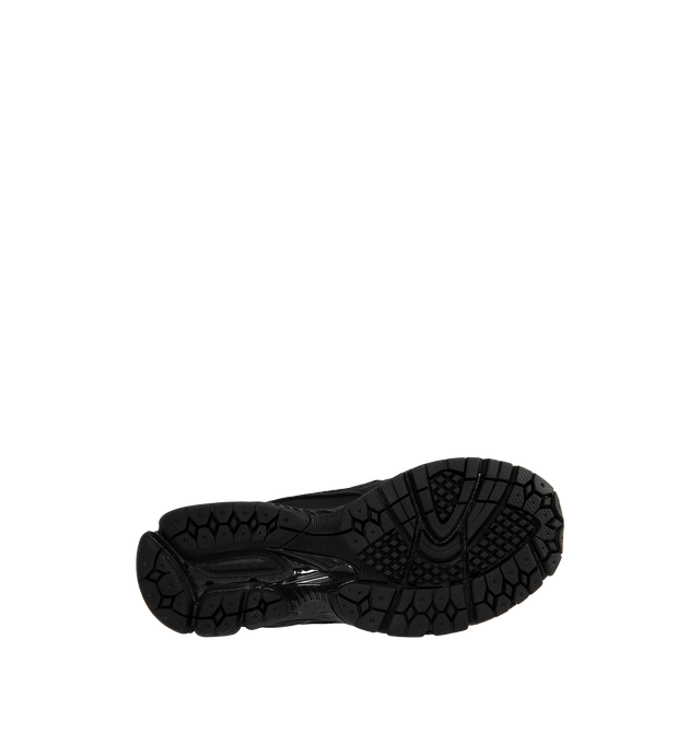 Image 4 of 5 - BLACK - NEW BALANCE 1906L Sneaker featuring a classic penny loafer shape, open holed mesh upper, curvilinear synthetic overlays, 860v2 sole unit, segmented ABZORB SBS pods at the heel and N-ergy outsole. 