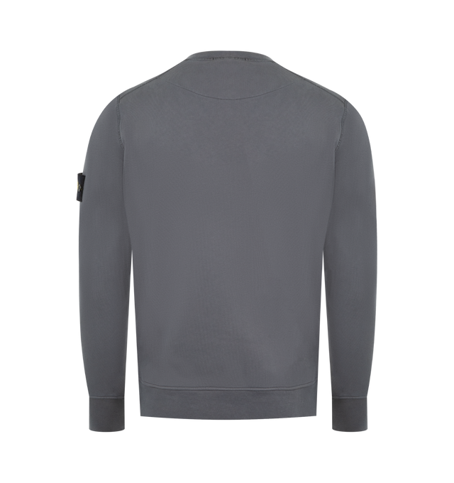 Image 2 of 3 - GREY - STONE ISLAND Crewneck Sweatshirt featuring ribbed neckline, lunette under back neckline with internal reinforcement, raglan sleeves on back, Stone Island badge on left sleeve, ribbed cuffs and bottom band, overlock stitching at seams and regular fit. 100% cotton. 
