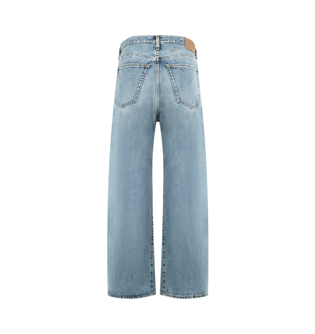 Image 2 of 3 - BLUE - TOTEME Twisted Seam Denim full length featuring relaxed fit, straight-leg, a dropped rise, constructed with directional side seams, button fly, silver-tone hardware, five pockets, belt loops, finished hem and leather patch. 100% organic cotton. 